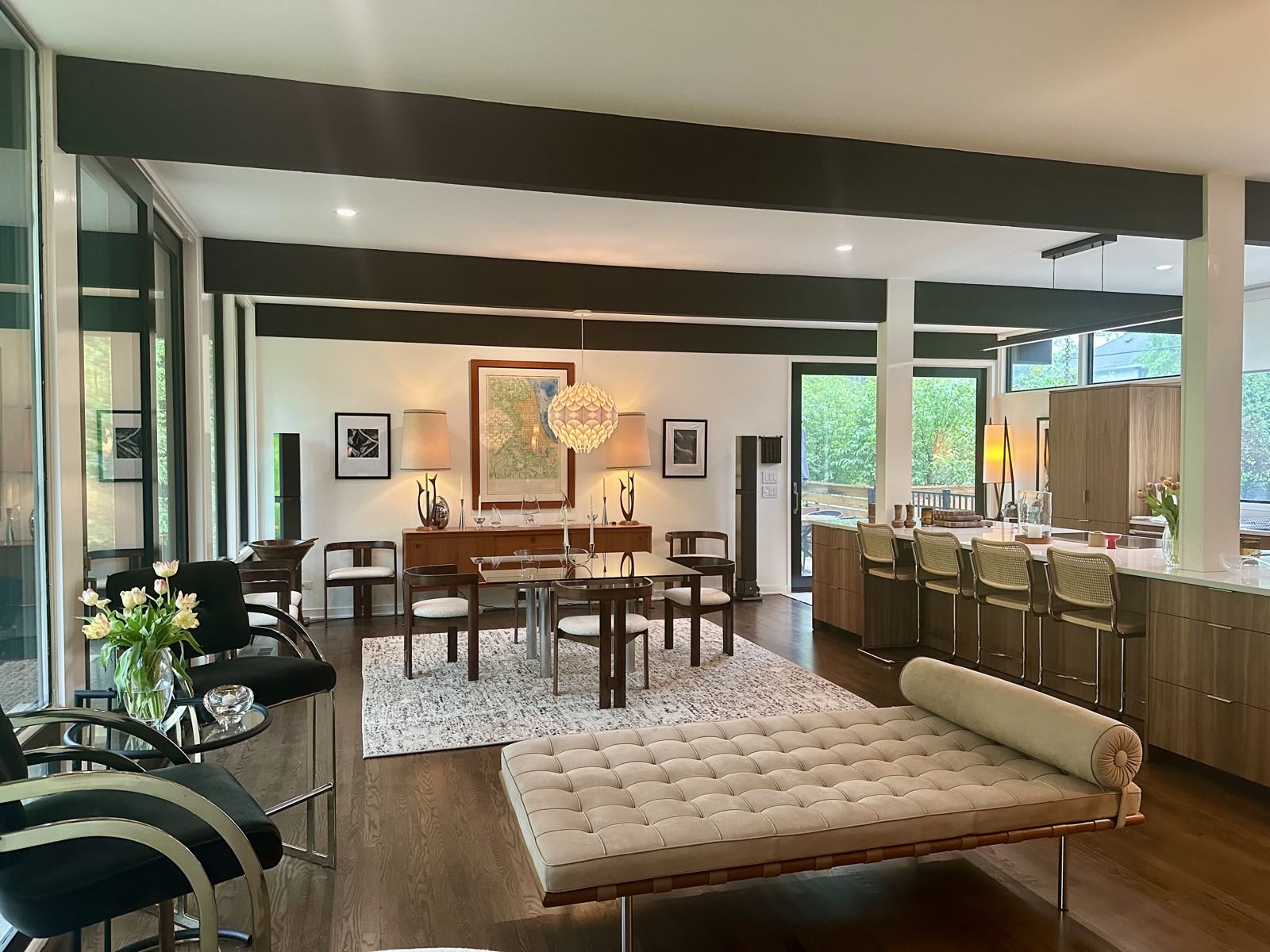 View from the living room across to the dining area and the kitchen counter beyond.