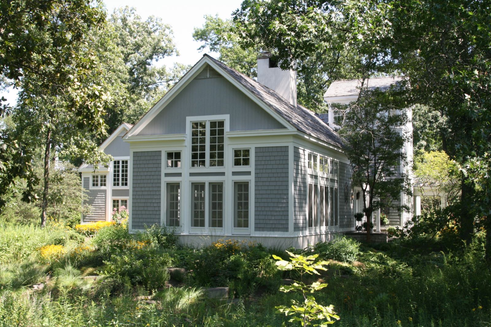 The house from the south-west, showing how the separate volumes step against one another.